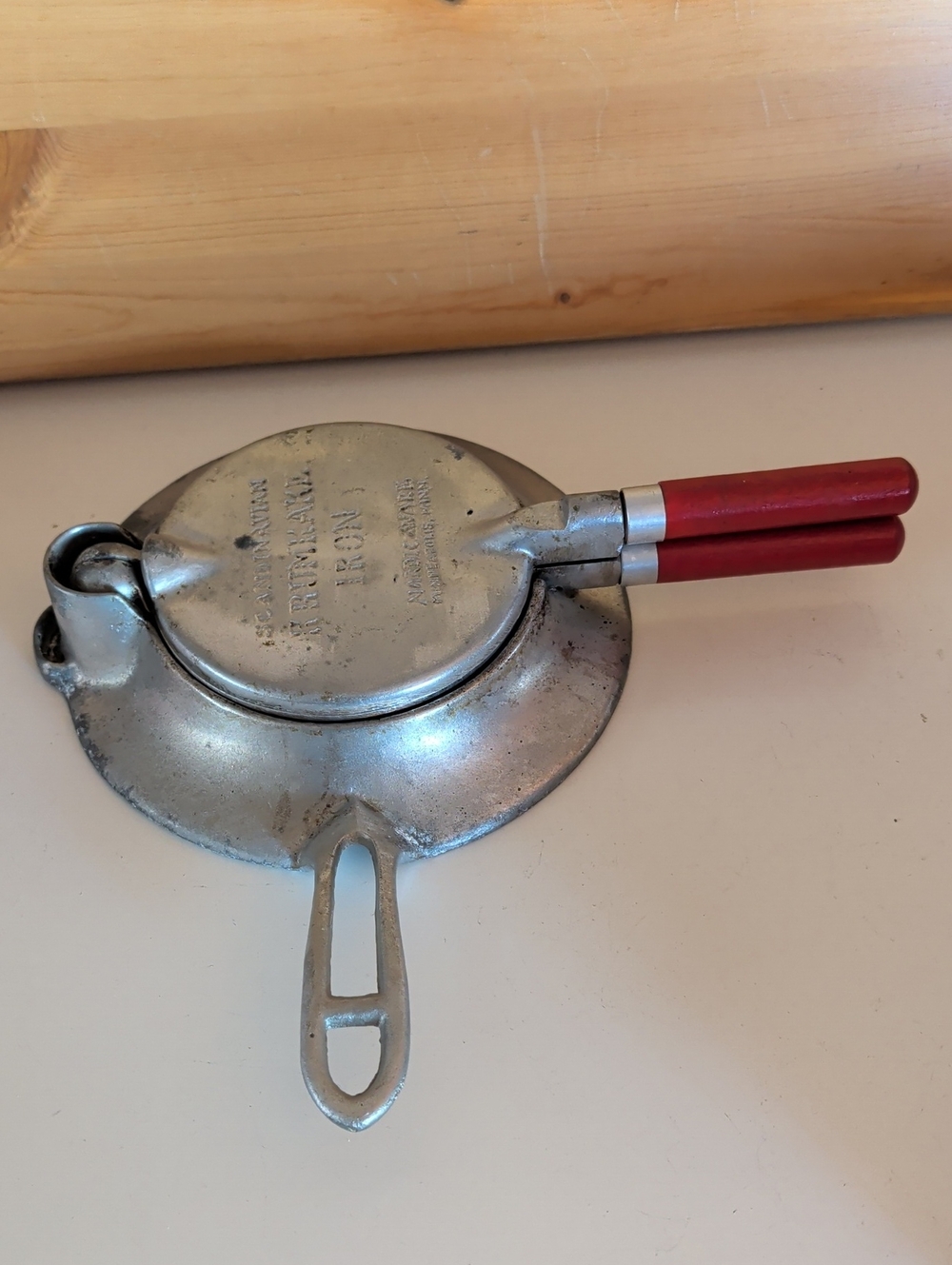 VTG. Nordic Ware Krumcake Iron.Red-Handled Cast Aluminum Stove-Top Ironing Press